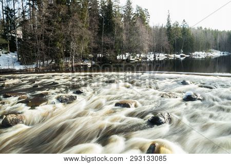 Long Exposure Photo. Dam And Threshold On The River Jokelanjoki, Kouvola, Finland