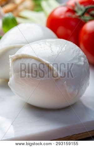 Balls Of Buffalo Mozzarella, Soft Italian Scheese Made From The Milk Of Italian Mediterranean Buffal