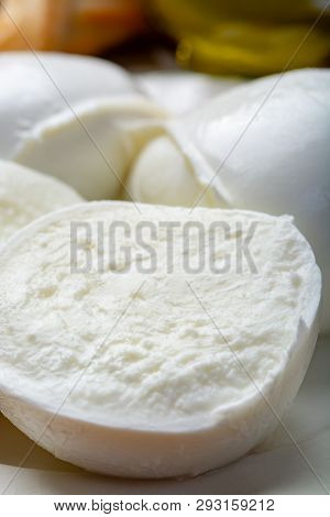 Balls And Pieces Of Buffalo Mozzarella, Soft Italian Scheese Made From The Milk Of Italian Mediterra
