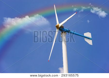 Wind Turbine With Blue Sky And Rainbow, Energy Conservation