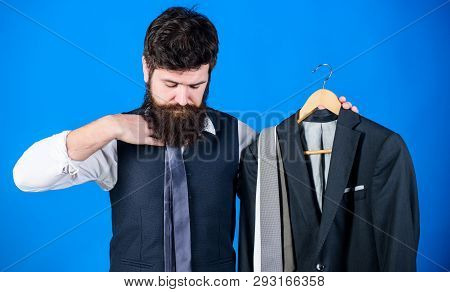 Making Necessary Purchase. Bearded Man Buying Fashion Purchase In Mens Store Department. Businessman