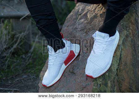 Cape Town, South Africa. 03 April 2019. A Pair Of White And Red Adidas Nmd Running Shoes.