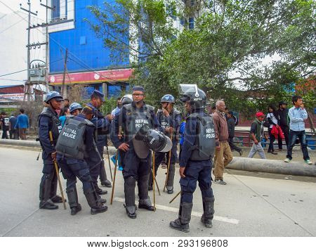 Riot Police In Riot Gear