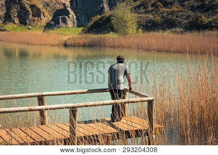 A Young Man Alone On A Lake, Portrait, La Arboleda, Basque Country