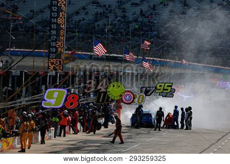 March 31, 2019 - Ft. Worth, Texas, USA: Kyle Larson (42) makes a pit stop for the O'Reilly Auto Parts 500 at Texas Motor Speedway in Ft. Worth, Texas.