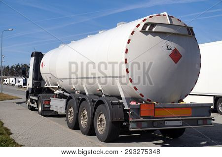 Truck With A Specialist Semi-trailer. Road Tanker Designed For The Carriage Of Dangerous Substances 