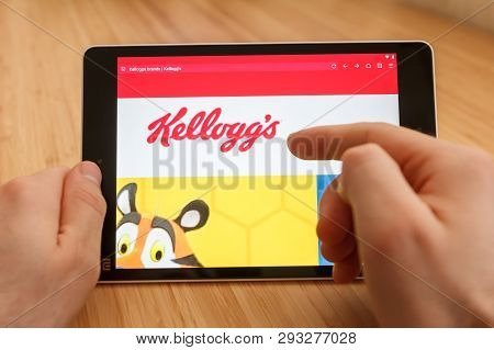San Francisco, Us - 1 April 2019: Close Up To Hands Holding Tablet Using Internet And Looking Throug