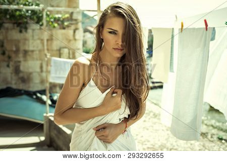 Sexy Young Brunette Woman At Sunny Day