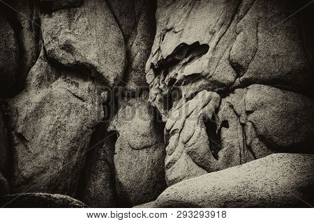 Black And White Photo Of Sea Stones Of Strange Abstract Shape