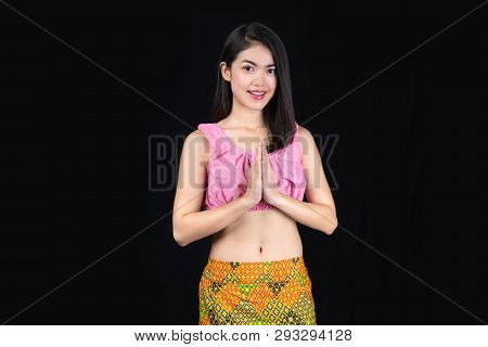Beautiful Asian Girl Putting The Hands Together In Front Of Your Chest As A Salute To Pay Respect To