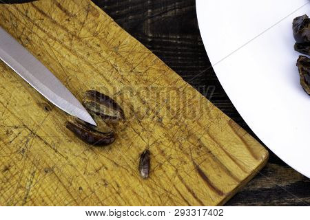 Hushaf - Date Milk, A Traditional Dish Of Ramadan, Cooking, Ingredients, Cut Pitted Dates, A Knife A