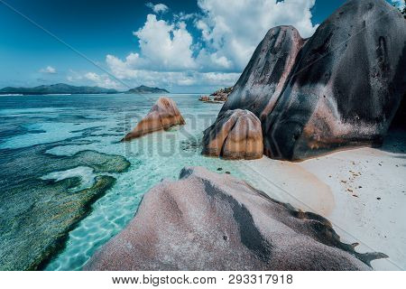 Granite Rocks Boulders At The Best-known Anse Source Dargent Beach On Island La Digue In Seychelles.