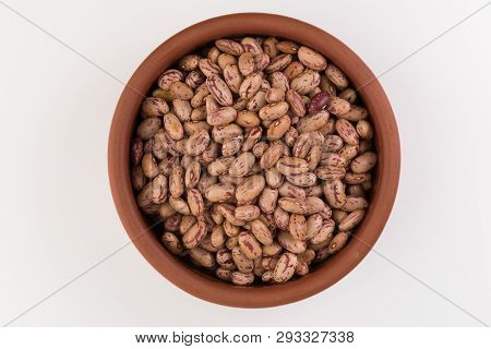 A Plate Of Beans On White Background