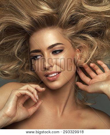 Cheerful Sexy Blond Woman With Perfect Hair