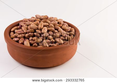 A Plate Of Beans On White Background