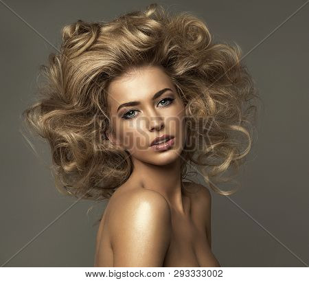 Portrait Of Sexy Blond Woman With Curls