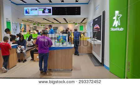 Singapore- 14 Mar, 2019: Customers Visit Starhub Retail Shop In Singapore. Starhub Ltd Is One Of The