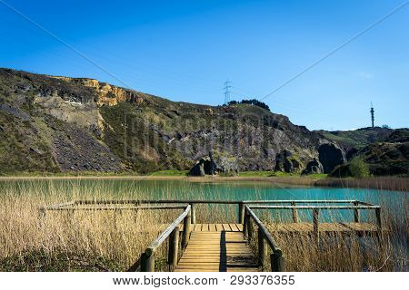 Wooden Footbridge Next To A Lake, La Arboleda, Basque Country