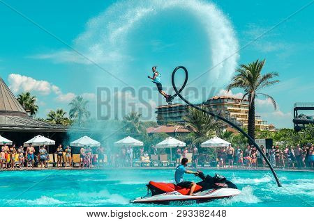 Belek, Turkey - September 12, 2018. Exciting Fly Board Watershow At The Pool Party On A Sunny Summer