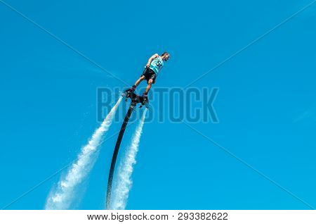 Belek, Turkey - September 12, 2018. Exciting Fly Board Watershow On A Sunny Summer Day. A Man Is Doi