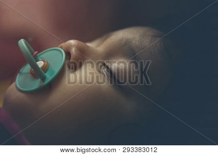 Closeup Of An Indian Toddler Baby Sleeping. Closeup Of An Asian Indian Infant Baby Sleeping
