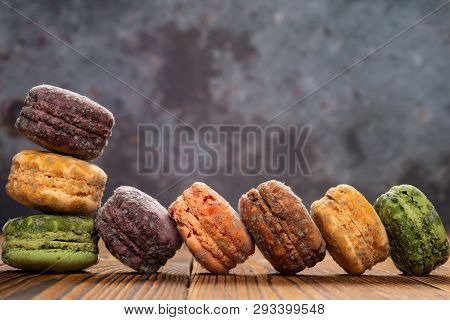 8 Pcs Moldy Macaroons On A Wood Table