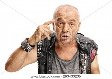 Mature male punker holding finger on his temple isolated on white background