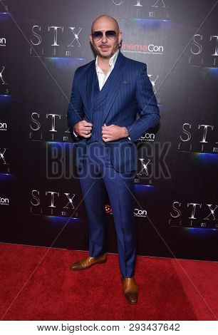LAS VEGAS - APR 02:  Pitbull aka Armando Christian Perez arrives for CinemaCon 2019 - STXfilms presentation 