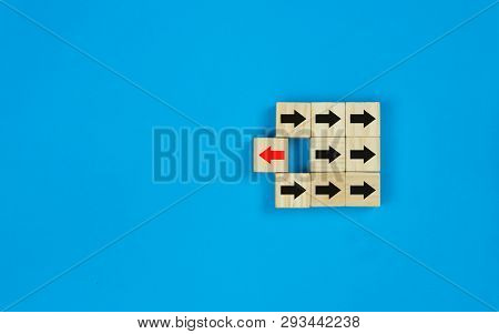 Wooden Square Block The Red Arrow Symbol Turns To The Opposite Direction Of Black Arrows Symbol. Thi