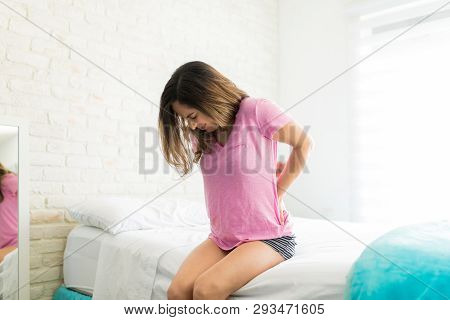 Woman Getting Miserable Lower Back Pain During Period Due To Hormonal Changes