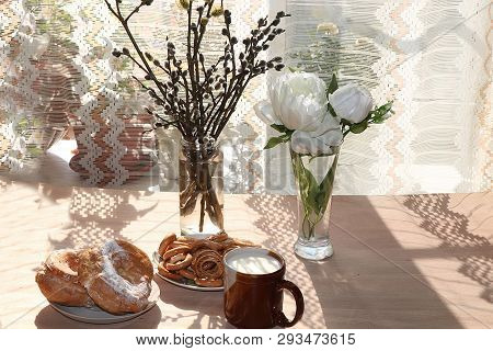 A Mug Of Milk, A Cup Of Corn And Cake On A Sunny Table, A Bouquet Of Spring Flowers For Mood, Diet F