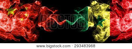 China Vs Senegal, Senegalese Smoke Flags Placed Side By Side. Thick Colored Silky Smoke Flags Of Chi