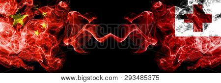 China Vs Tonga, Tongan Smoke Flags Placed Side By Side. Thick Colored Silky Smoke Flags Of Chinese A