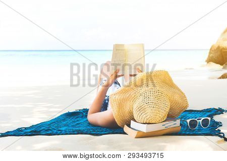Summer Beach Holiday Woman Reading A Book On The Beach In Free Time .