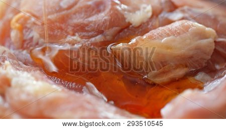 Add oil to marinade chicken fillet