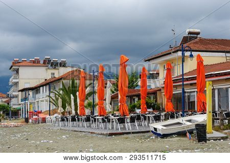 Leptokaria, Pieria, Central Macedonia, Greece - 11th May 2015: Empty outdoor cafe at the beach just prepared for the high season