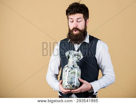 Saving Money For Future. Businessman Focusing On Current And Future Savings. Bearded Man Thinking Of