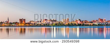 Portland, Maine, USA downtown skyline from Back Cove at dawn.