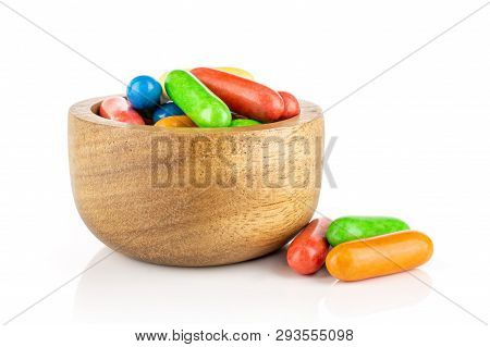 Lot Of Whole Colourful Sweet Licorice Comfit In A Wooden Bowl Isolated On White Background