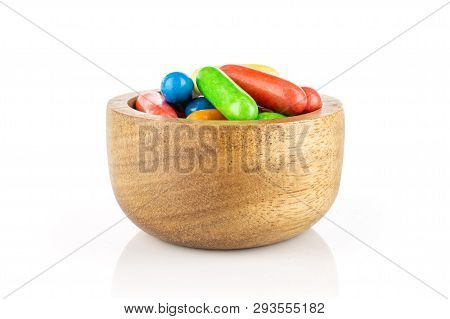 Lot Of Whole Sweet Licorice Comfit In A Wooden Bowl Isolated On White Background