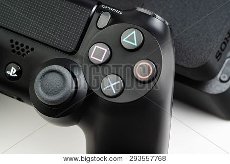 Stavropol, Russia - 17 March 2019. Closeup Photo Of Video Game Console Sony Playstation 4 And Contro