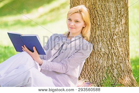 Female Self Improvement. Girl Lean On Tree While Relax In Park Sit Grass. Self Improvement Book. Bus