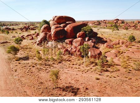 Massive Boulders Formed By Erosion In The Karlu Karlu, Devils Marbles Area Of The Outback (northern 