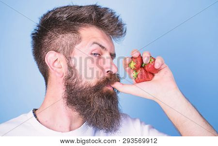 Man Strict Face Enjoy Fresh Drink Strawberry Juice. Fresh Juice Concept. Man Drinks Strawberry Juice