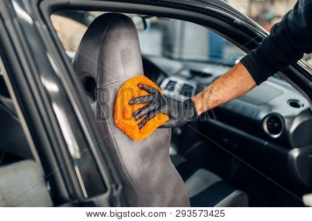 Chemical cleaning of car seats with spoonge