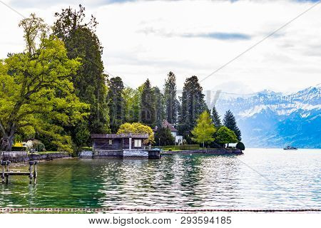 House Near Lake Thun And Travek Ship With View Of Bernese Alps Mountain Berne, Switzerland Europe