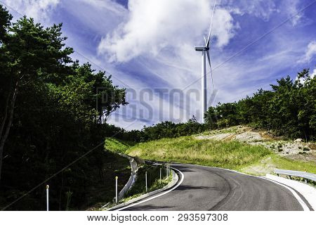 Yhe Wind Mill Tower On The Hill