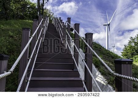 Yhe Wind Mill Tower On The Hill