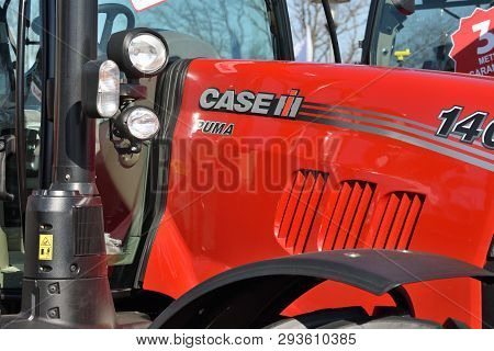 Kaunas, Lithuania - April 04: Case Ih Tractor And Brand Logo In Kaunas On April 04, 2019. Case Ih Is