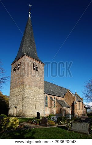 St. Antonius Church In Kalkar Hanselaer, Germany On A Sunny Day